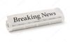 depositphotos_68946757-stock-photo-rolled-newspaper-with-the-headline.jpg